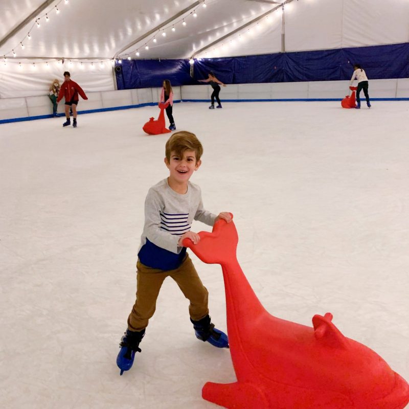 Boy smiling w whale ice